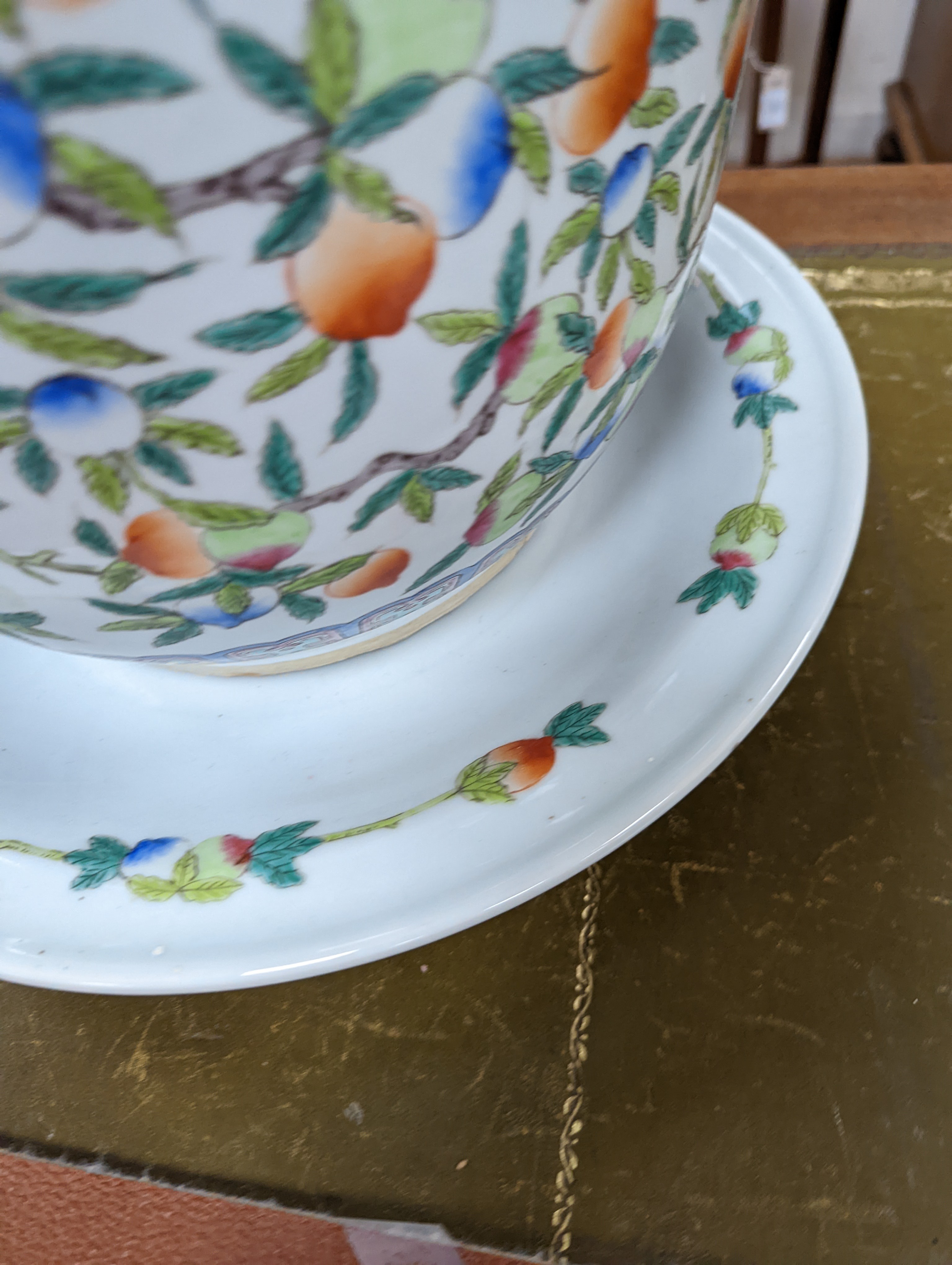 A 20th century Chinese porcelain jardiniere and dish, diameter 36 cms.